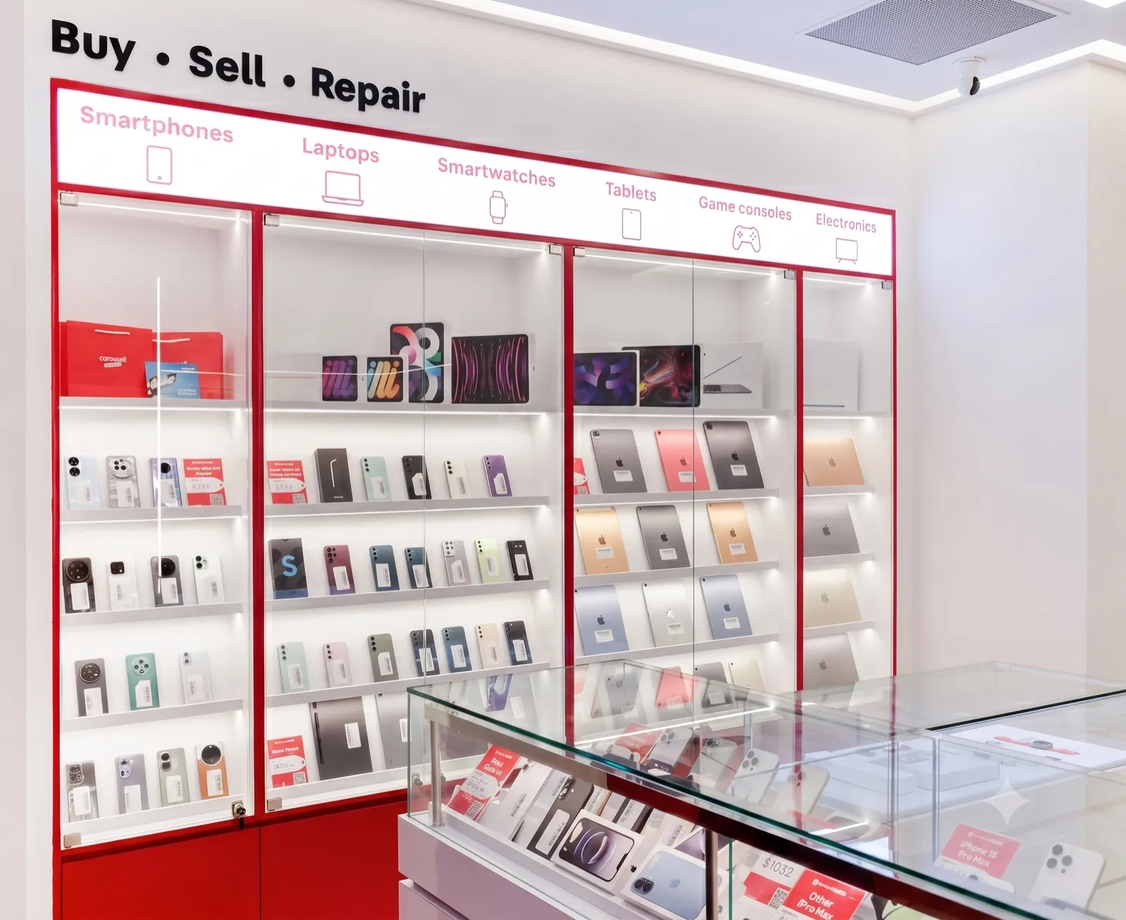 The Laku6 store: shelves of used smartphones, tablets, and laptops
